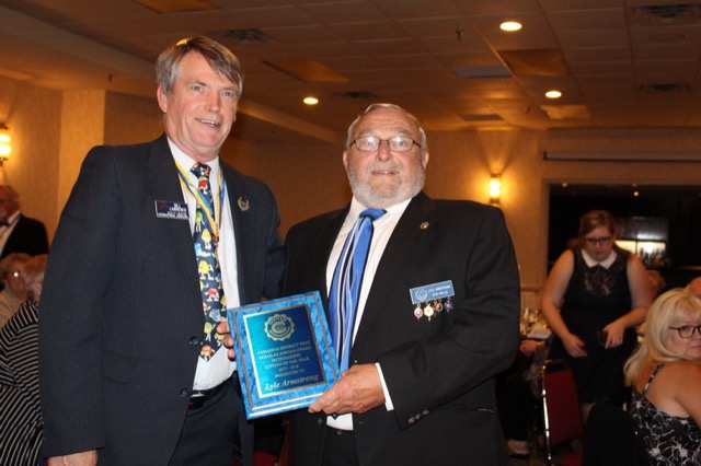 Civitan Lyle receiving Civitan of the Year award from I.D. Bill